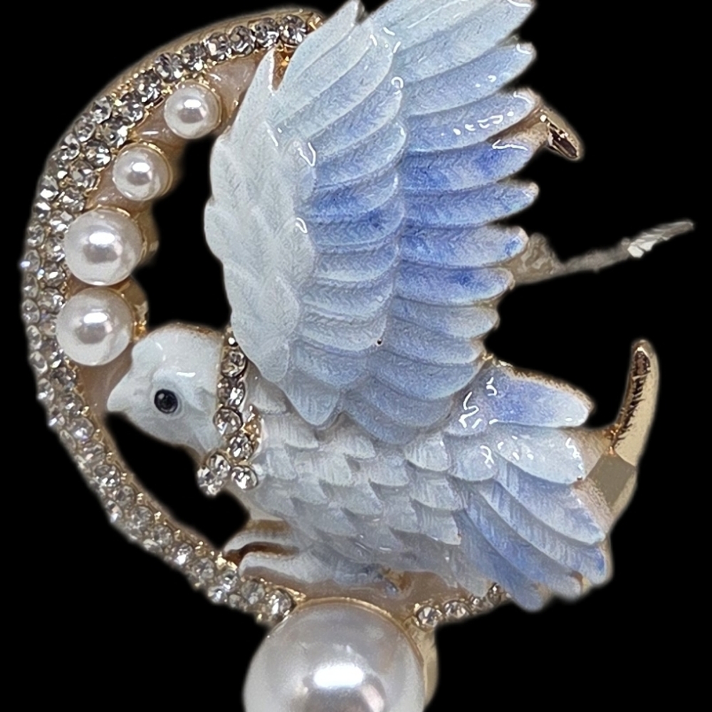 Elegant Blue and Gold Bird Brooch